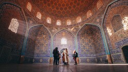 People visit the 17th-century Sheikh Lotfollah Mosque, one of the masterpieces of Iranian architecture in Isfahan.