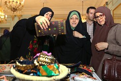 (From left) CHHTO deputy director Pouya Mahmoudian and Vice President for Women’s and Family Affairs Masoumeh Ebtekar visit an exhibition of traditional women’s wear and personal ornamentation at Tehran’s Niavaran Cultural-Historical Complex on July 10, 2019.