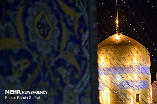 Ritual of changing flag of shrine of Imam Reza (AS)