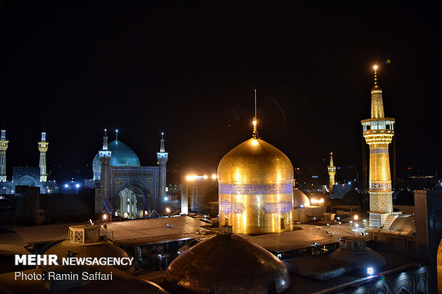 Ritual of changing flag of shrine of Imam Reza (AS)