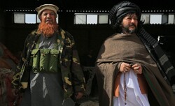 Mohammad Fili (L) and Amir-Hossein Seddiq act in a scene from “Nirvana”.