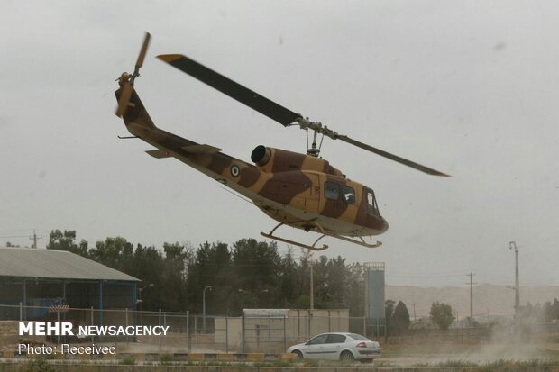 Army copters rescue people trapped in oak forest fires in Fars province