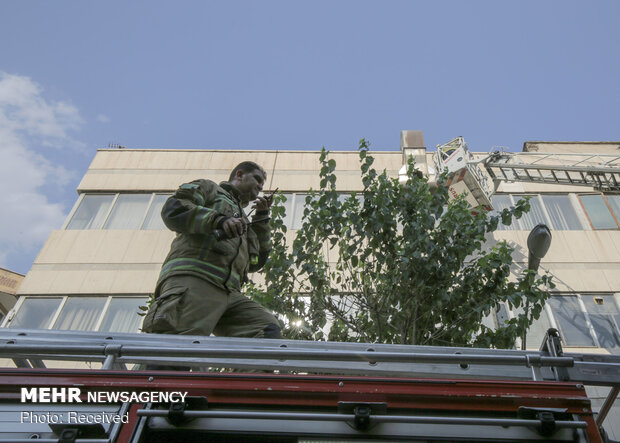 Firefighters extinguish warehouse fire in Tehran