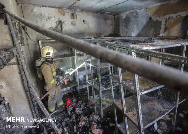 Firefighters extinguish warehouse fire in Tehran