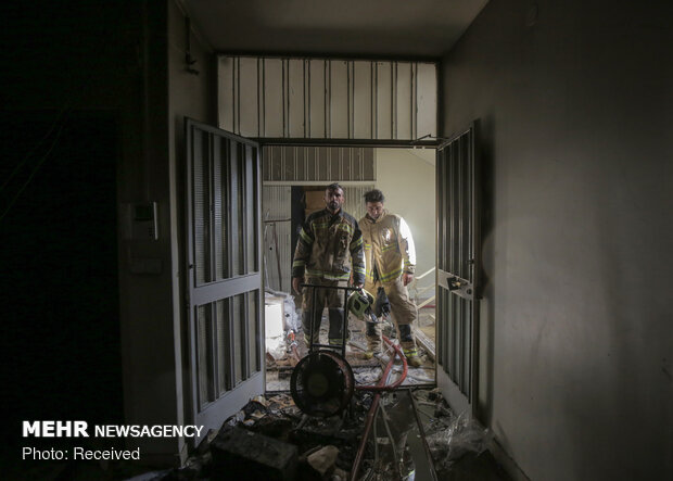 Firefighters extinguish warehouse fire in Tehran