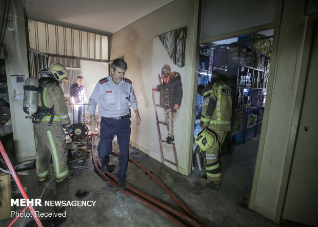 Firefighters extinguish warehouse fire in Tehran