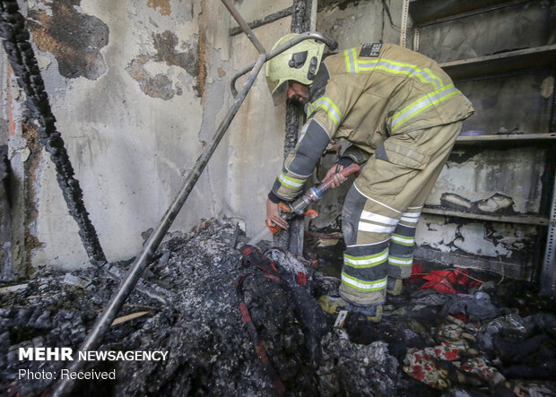 Firefighters extinguish warehouse fire in Tehran