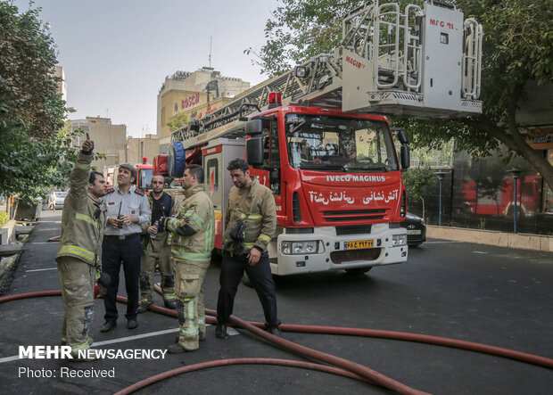 Firefighters extinguish warehouse fire in Tehran