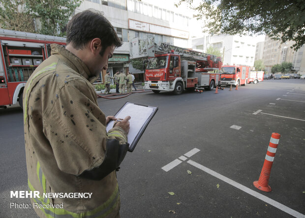 Firefighters extinguish warehouse fire in Tehran