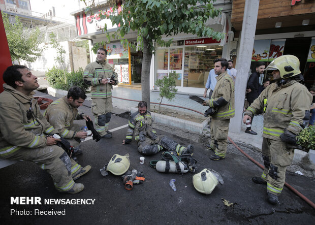 Firefighters extinguish warehouse fire in Tehran