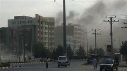 Smoke rises from the site of an attack targeting the Kabul office of the running mate of Afghan President Ashraf Ghani in Kabul on July 28, 2019. (Photo by AFP)