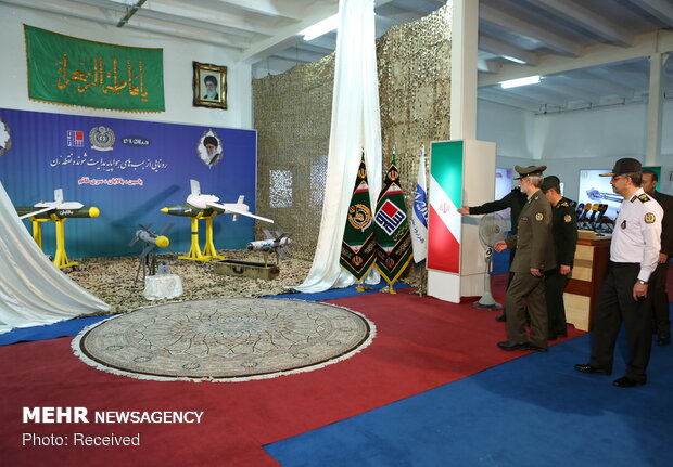 Iran Defense Ministry unveils UCAV precious guided bombs, missiles