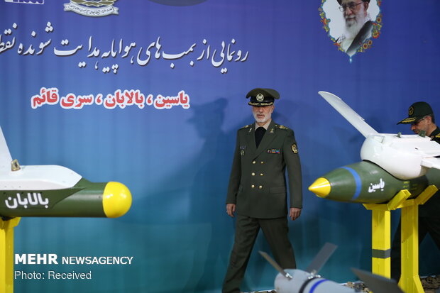 Iran Defense Ministry unveils UCAV precious guided bombs, missiles