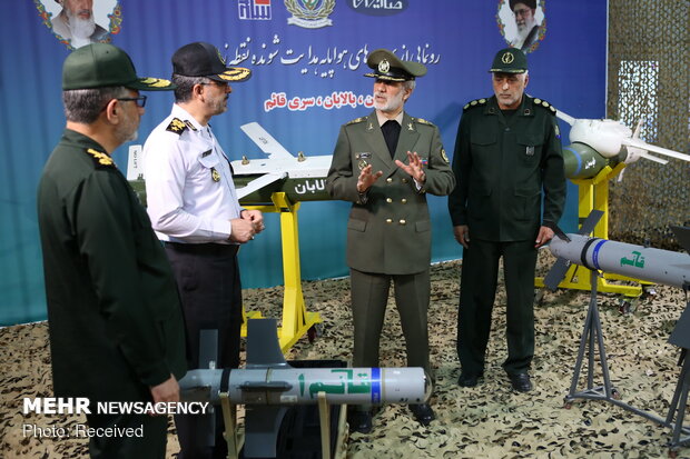 Iran Defense Ministry unveils UCAV precious guided bombs, missiles