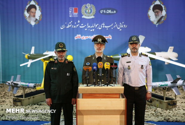 Iran Defense Ministry unveils UCAV precious guided bombs, missiles