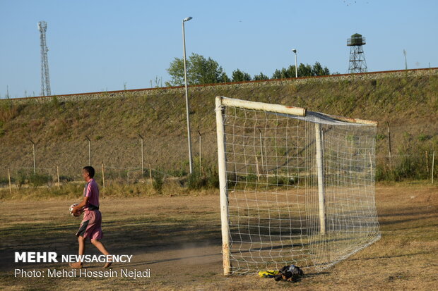 Playing football at border with Azerbaijan