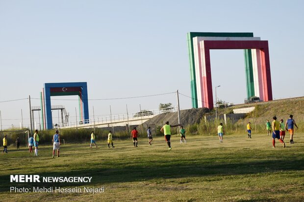 Playing football at border with Azerbaijan