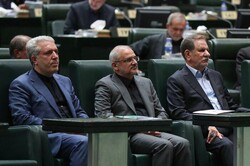 Mounesan (left) and Haji-Mirzaee (center) expecting poll results as they sit beside First Vice President Es’haq Jahangiri (right)