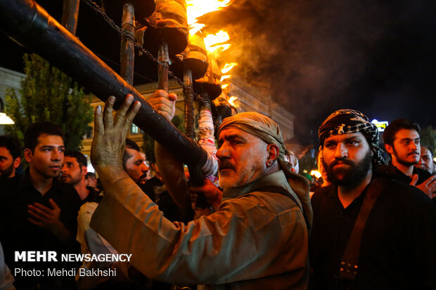 Iraqis residing in Qom hold torch carrying rituals