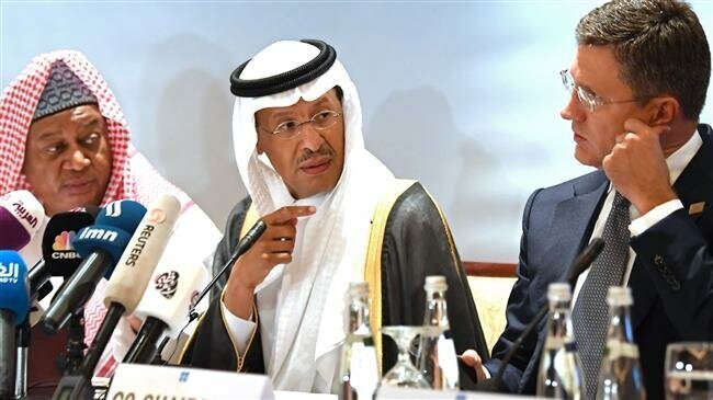 OPEC Secretary General Mohammed Sanusi Barkindo (L), Saudi Arabia's Energy Minister Prince Abdulaziz bin Salman (C) and Russian Energy Minister Alexander Novak (R) attend an OPEC+ meeting in the UAE capital Abu Dhabi on September 12, 2019. (AFP photo)