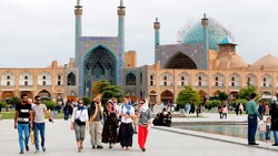 Tourists visit the UNESCO-registered Imam Square (originally named as Naqsh-e Jahan Square) in Isfahan, central Iran, April 12, 2018.