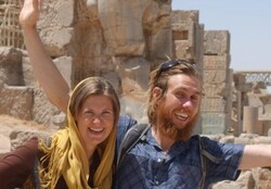 A Spanish couple poses for a photo during a visit to the UNESCO-registered Persepolis, which was once the ceremonial capital of the Persian Achaemenid Empire (c. 550–330 BC).