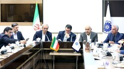 Iranian Industry, Mining and Trade Minister Reza Rahmani (3rd R) and ICCIMA Head Gholam-Hossein Shafeie (3rd L) in a working breakfast in Tehran on Tuesday