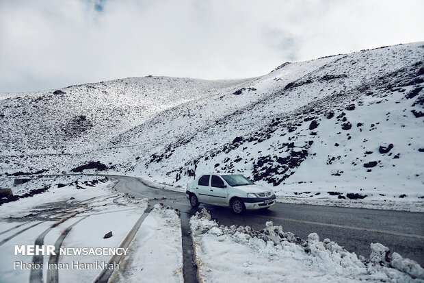 Snow whitens Hamedan's mountains