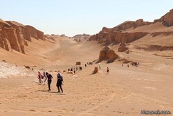 People visit Shahdad, a touristic part of the UNESCO-registered Lut desert, in Iran’s Kerman province.