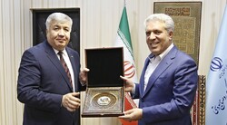 Iran’s tourism minister Ali-Asghar Mounesan (R) meets with Uzbekistan’s ambassador in Tehran Bakhodir Abdullaev at the Ministry of Cultural Heritage, Tourism and Handicrafts, December 3, 2019.