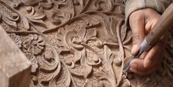 Malayer one step closer to 'a world city of woodcarving'