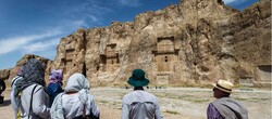  Travelers visit Naqsh-e Rostam, an Achaemenid-era rock-hewn necropolis in southern Iran