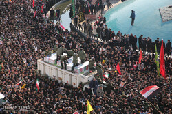 Packed crowds attend funeral procession of top military commander Qasem Soleimani in Tehran 