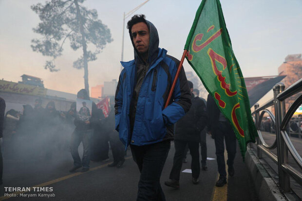 Packed crowds attend funeral procession of top military commander Qasem Soleimani in Tehran 