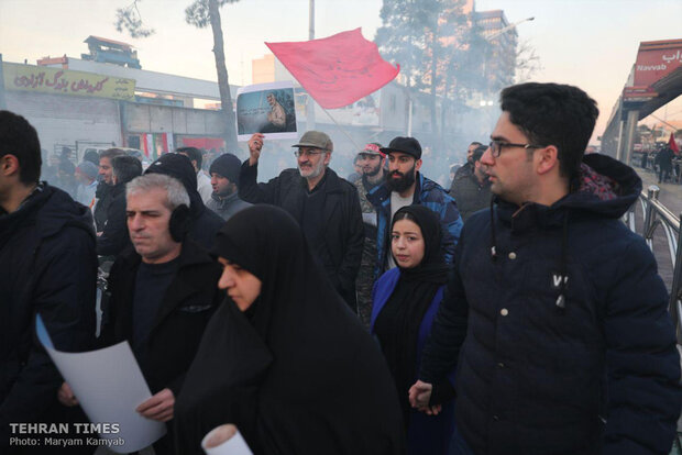 Packed crowds attend funeral procession of top military commander Qasem Soleimani in Tehran 