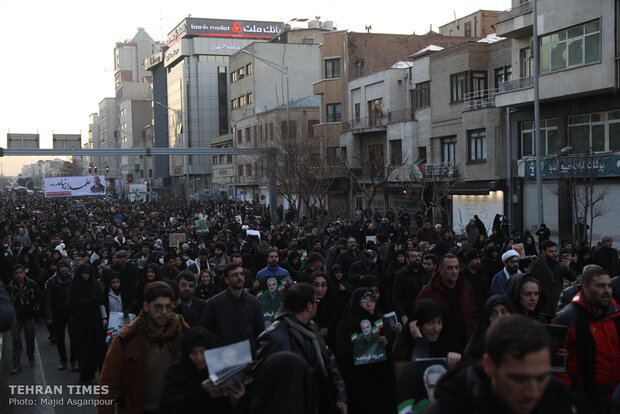 Packed crowds attend funeral procession of top military commander Qasem Soleimani in Tehran 