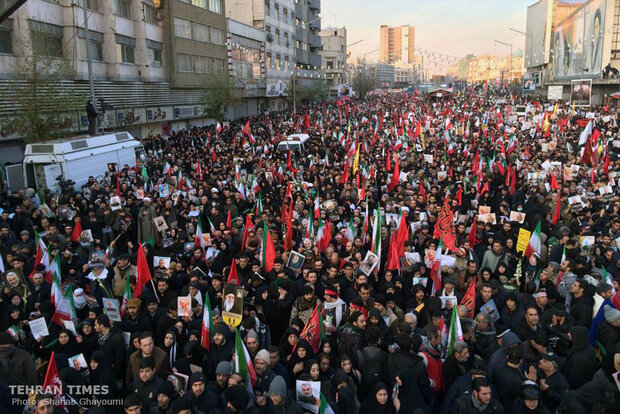 Packed crowds attend funeral procession of top military commander Qasem Soleimani in Tehran 