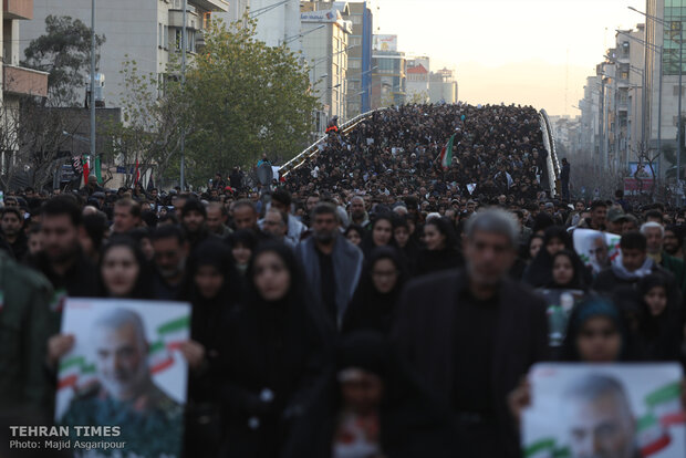 Packed crowds attend funeral procession of top military commander Qasem Soleimani in Tehran 