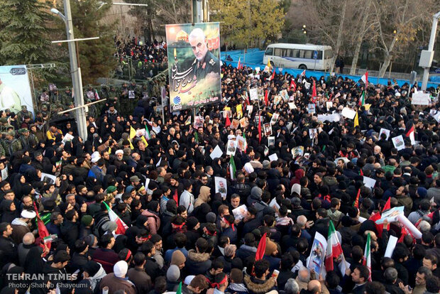 Packed crowds attend funeral procession of top military commander Qasem Soleimani in Tehran 