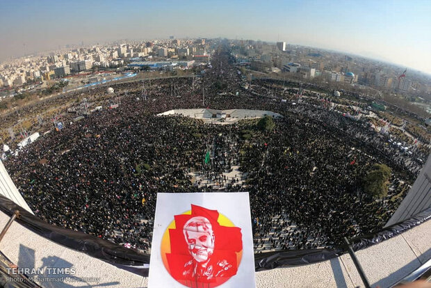 Packed crowds attend funeral procession of top military commander Qasem Soleimani in Tehran 