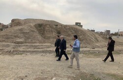 Local officials, experts visit the historical Tepe Ahranjan in Salmas county, northwest Iran.