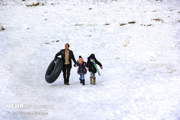 Snowfall brings happiness to western Iran