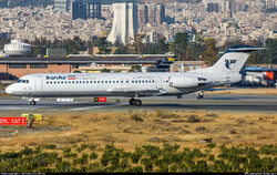  An Iran Air Fokker F100 is seen on the runway at the Mehrabad International Airport in western Tehran. (Photo credit: Mohammadreza Zeinloo)