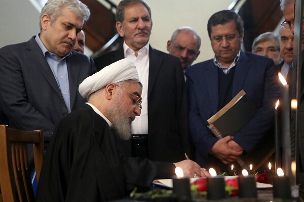 Pres. Rouhani signs memorial notebook for victims of Ukrainian plane incident 