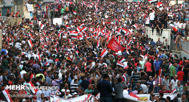 Iraqi people hold massive anti-US rally in Baghdad