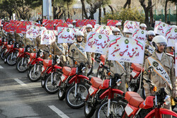 Armed forces stage motorcycle parade to commemorate anniv. of Islamic Revolution