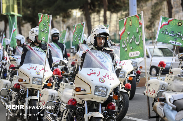 Armed forces stage motorcycle parade 