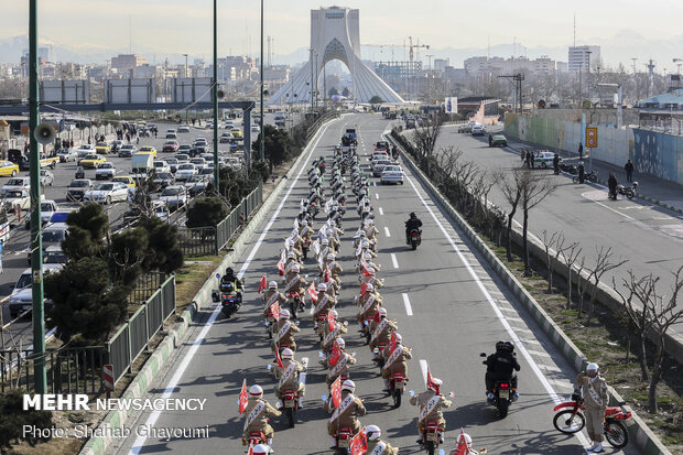 Armed forces stage motorcycle parade 