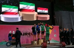 تیم ایران قهرمان رقابت های وزنه برداری جام فجر شد