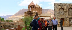 Travelers pose for a photo during their visits to the UNESCO-tagged Saint Stepanos Monastery in northwest Iran.
